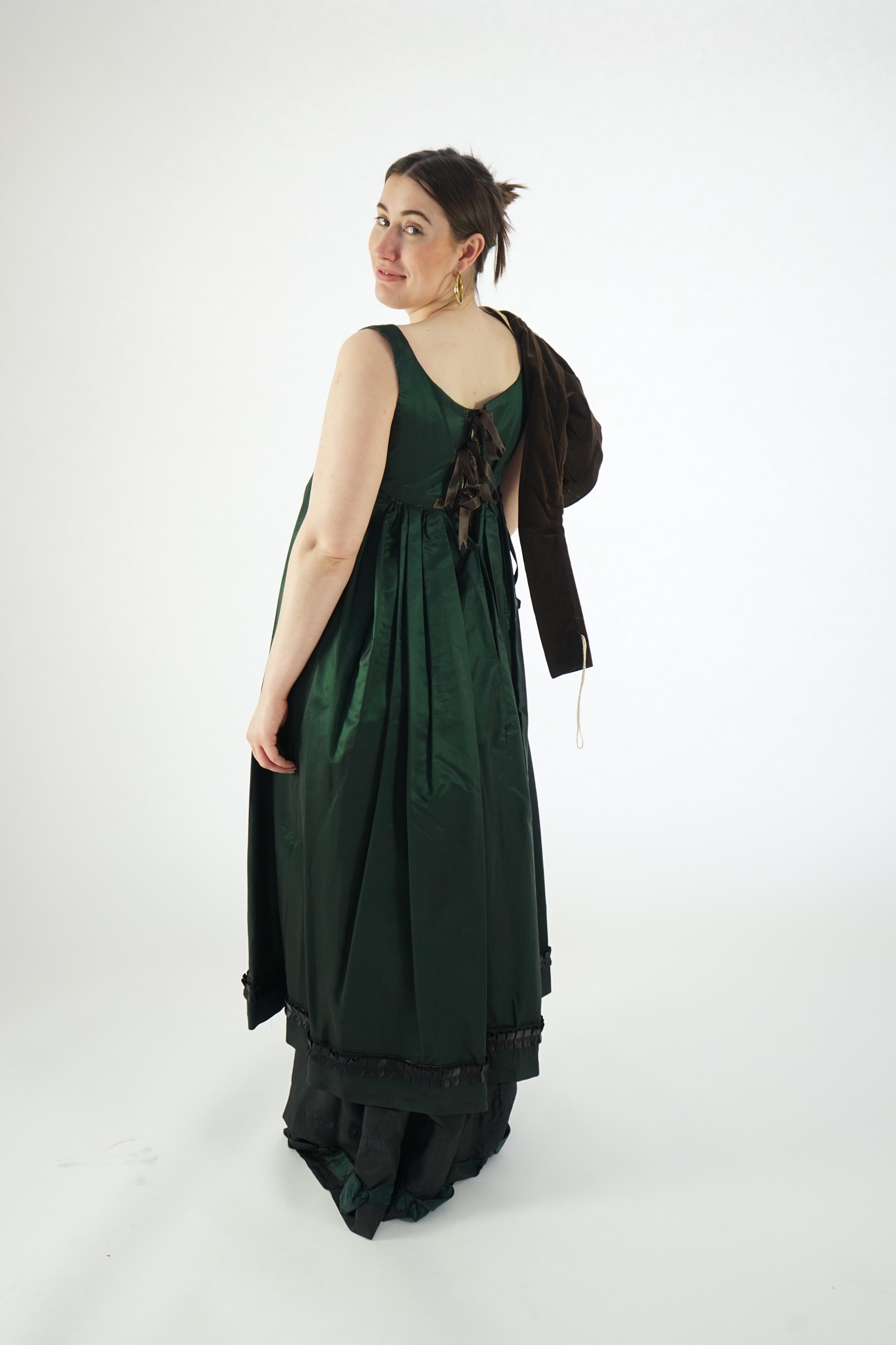 Two lady's Regency style day dresses (1 x dark green taffeta dress with brown short jacket and 1 x bottle green fine cord day dress and short matching jacket)., Ex Carl Rosa Opera Company.